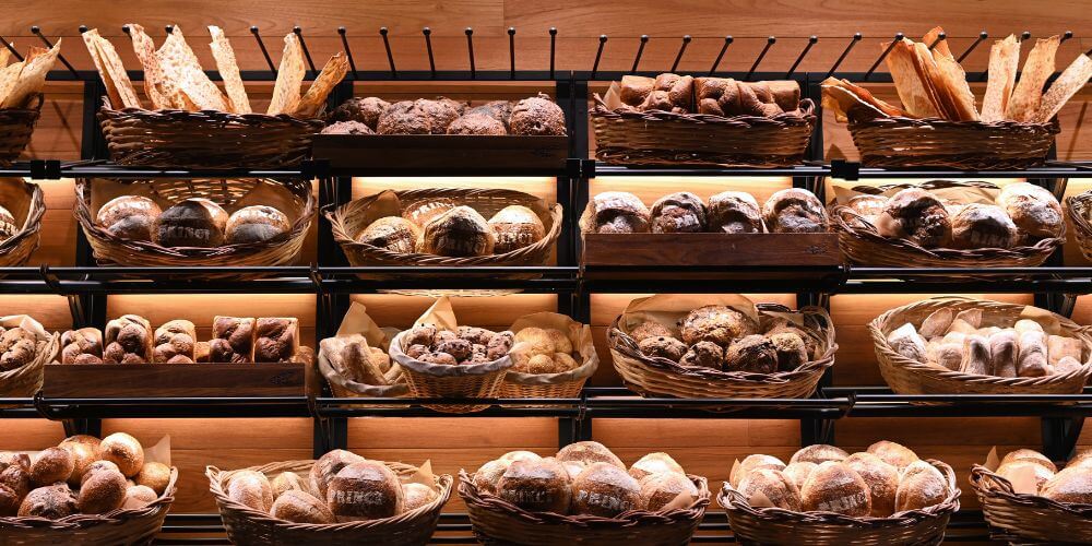 Présentoir métallique lumineux pour produits de boulangerie